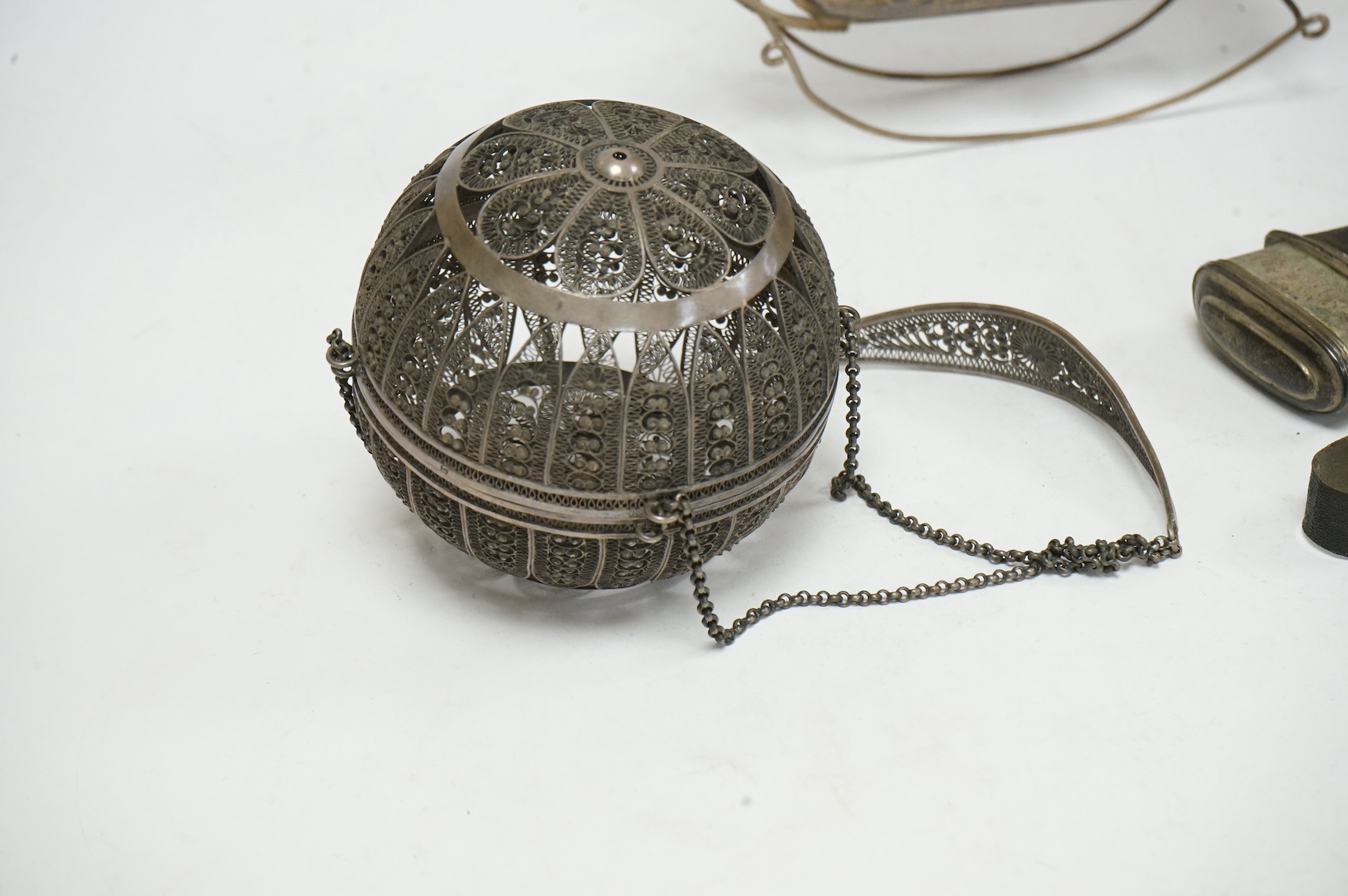 A Dutch? miniature white metal model of a three masted ship, on a rocking base, height 21.7cm, together with a filigree white metal pomander, makers mark IT? and an 18th century shagreen mounted white metal etui with acc